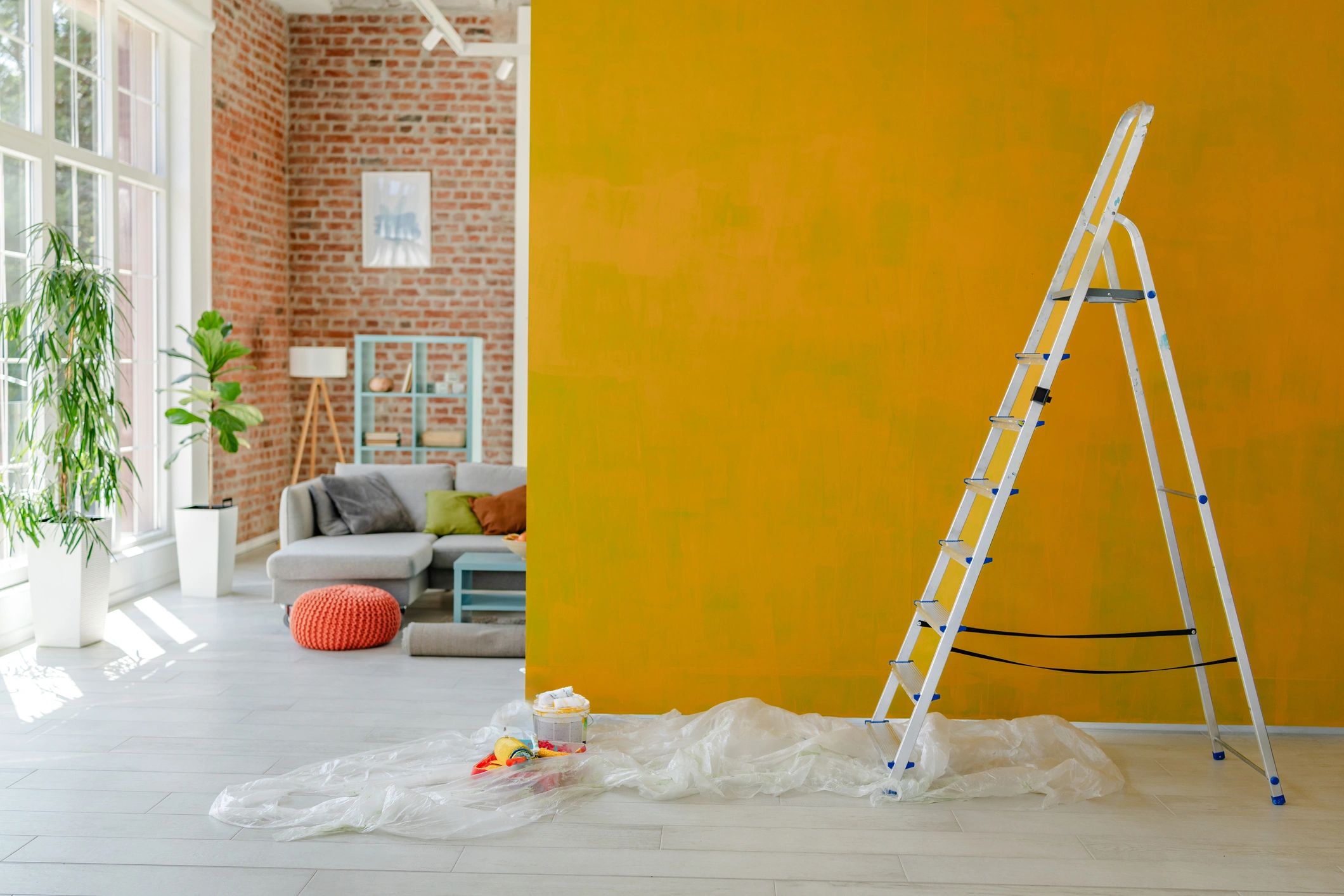Home improvement supplies and ladder during a project