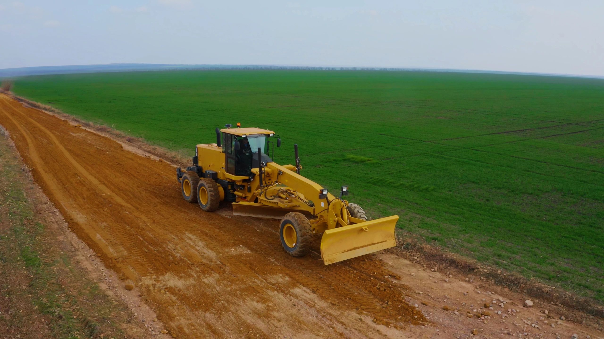 Heavy equipment working on a rural road