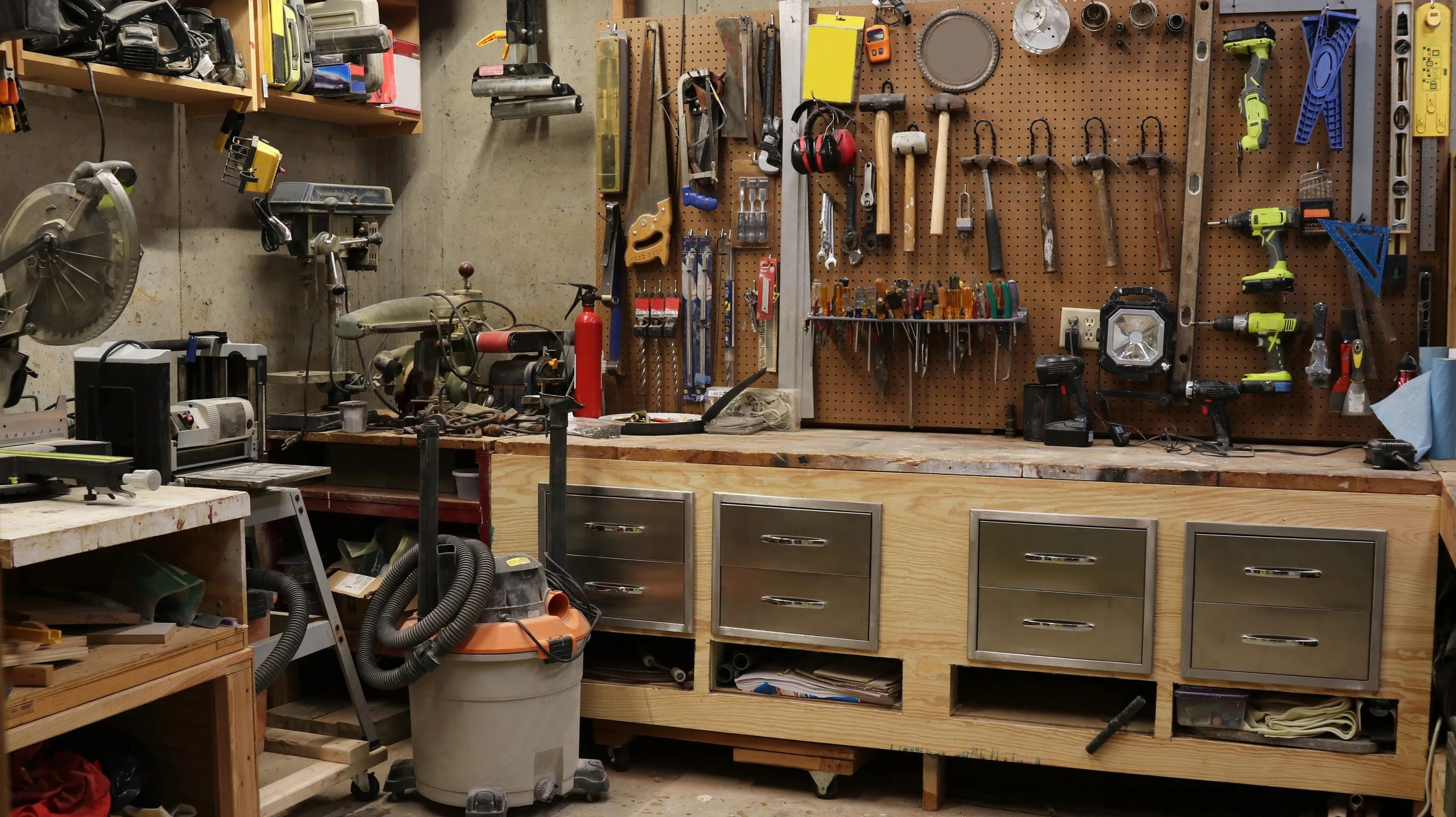 Garage workshop with contractor tools and equipment